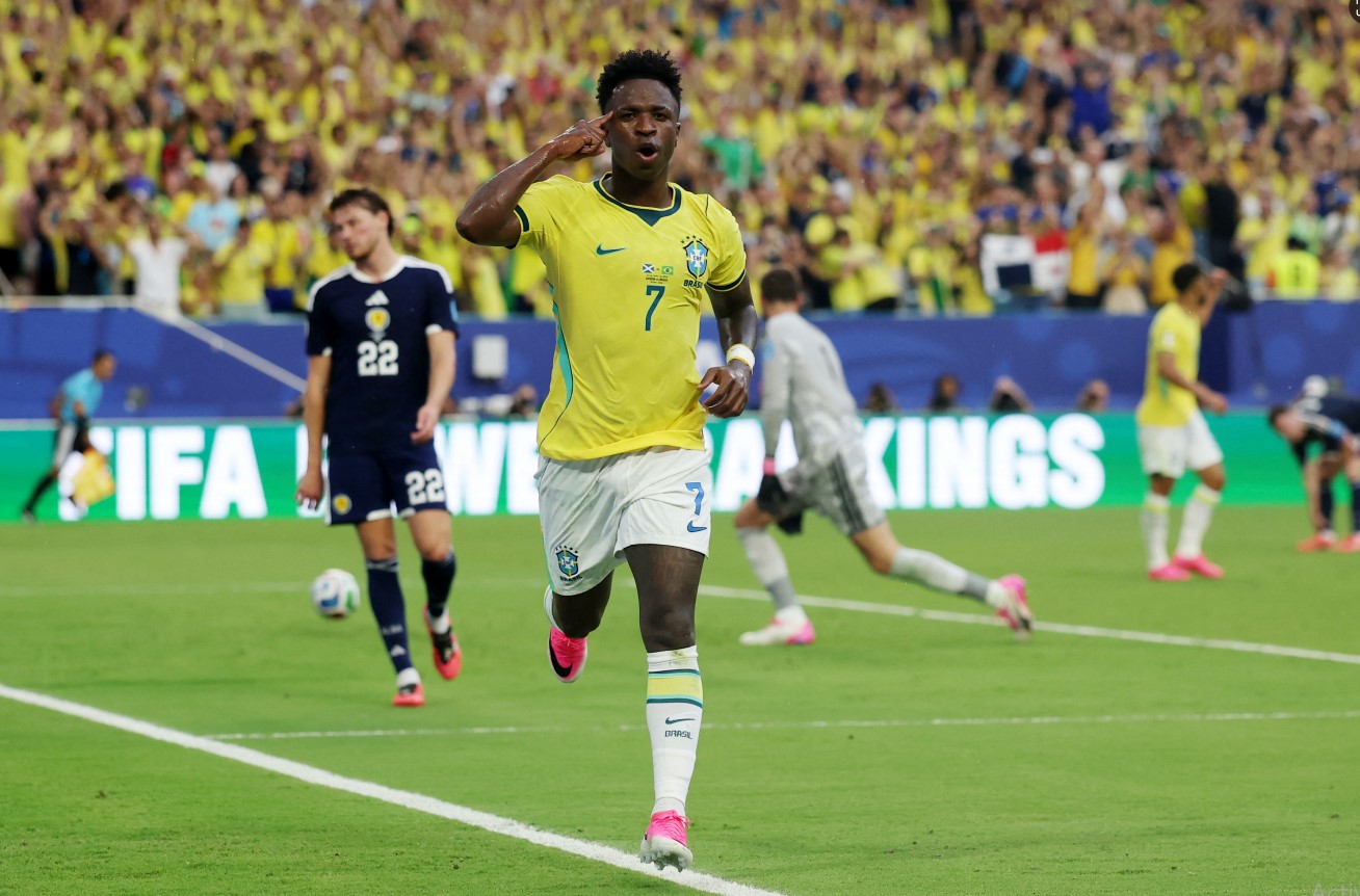 Vinicius double helps Brazil past Scotland into knockouts