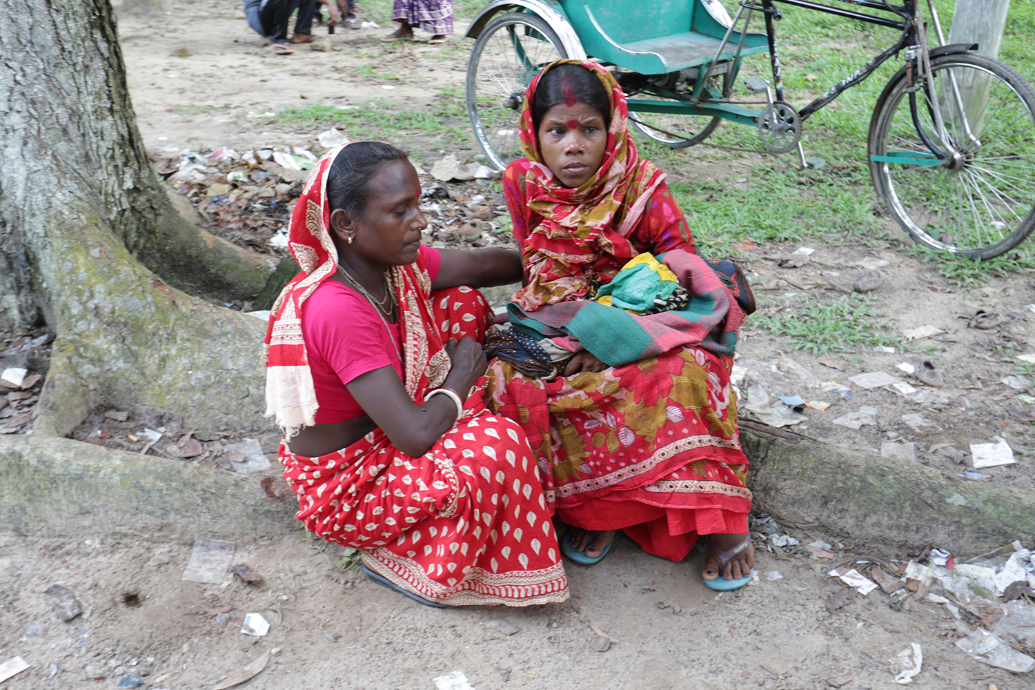 Why do women in tea gardens face higher reproductive health risks?