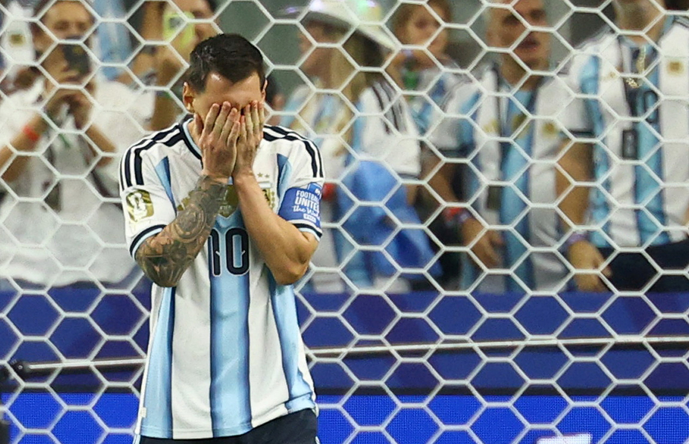 Messi reacts after missing the penalty