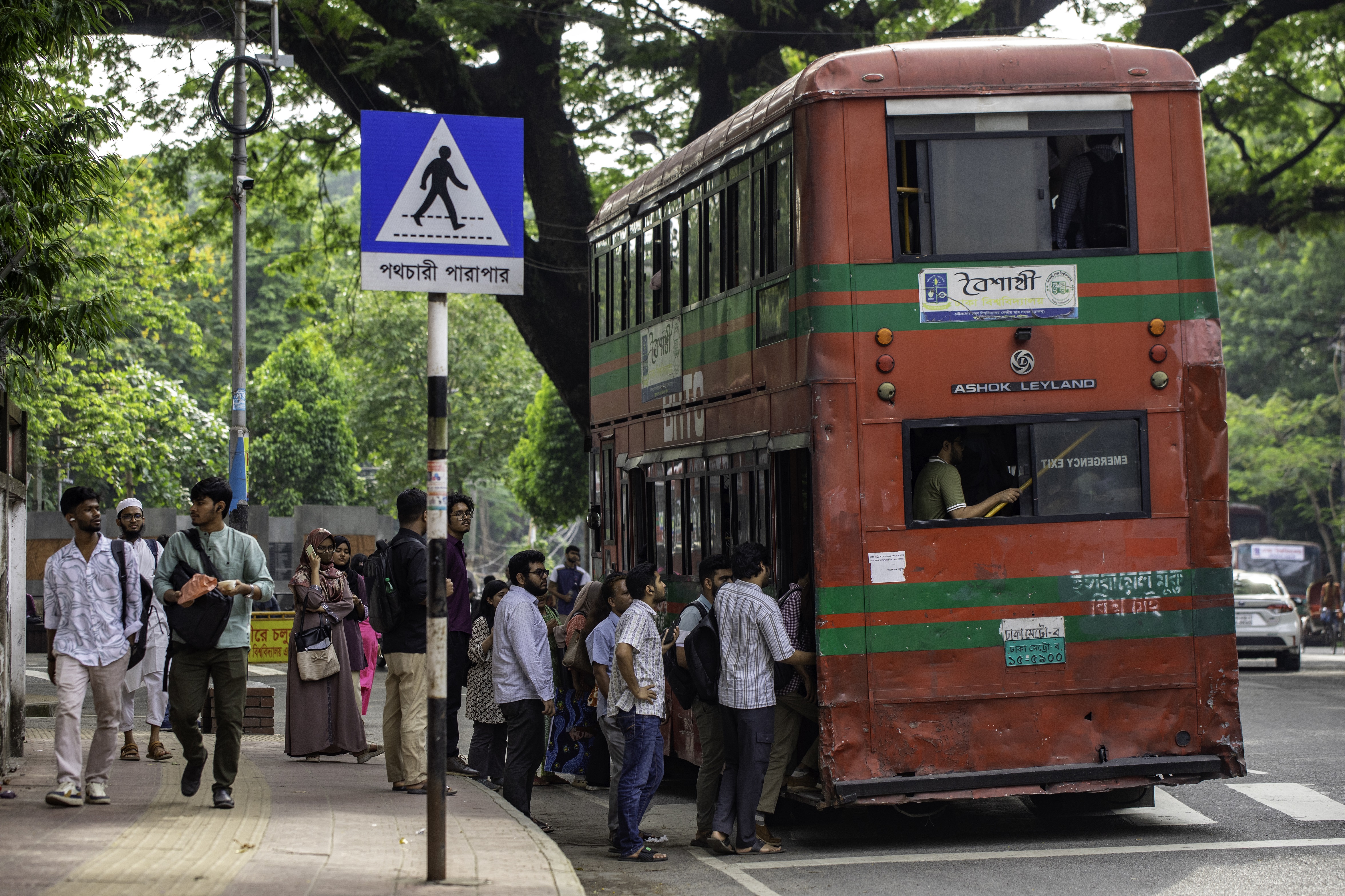 Passengers boarding a bus.