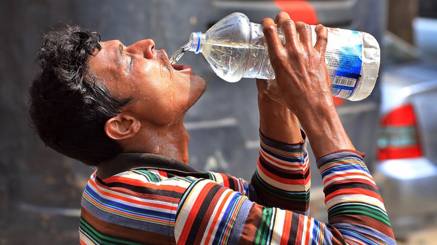 A worker drinking water