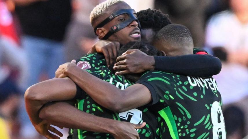 Nigeria's forward #09 Victor Osimhen celebrates his goal with teammates during the Africa Cup of Nations (CAN) quarter-final football match between Algeria and Nigeria at the Grand stadium in Marrakesh on January 10, 2026. Photo: AFP