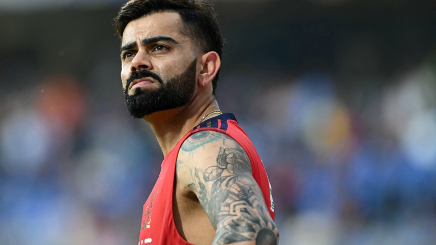 AFP__20260412__A7J98A6__v1__MidRes__CricketIndIplT20MumbaiBengaluru.jpg