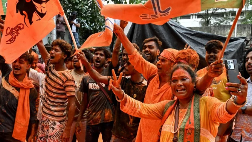 Bharatiya Janata Party (BJP) supporters celebrate after taking a lead during vote counting for the West Bengal Legislative Assembly elections, near the party head office in Kolkata on May 4, 2026. Photo: AFP