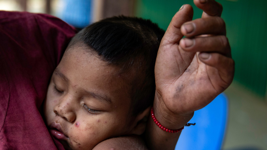 Child rests in sindukpara. Photo by Orchid Chakma 