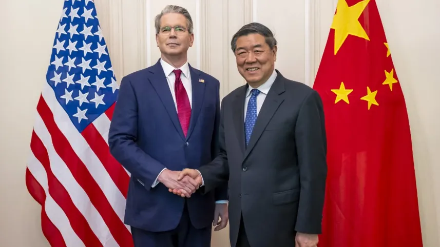 This handout photograph released by The Federal Department of Foreign Affairs or Swiss Foreign Ministry (FDFA) on May 14, 2025 shows US Treasury Secretary Scott Bessent (L) shaking hands with China’s Vice Premier He Lifeng during a meeting to discuss trade relations and tariffs, in Geneva, on May 10, 2025. Photo: AFP