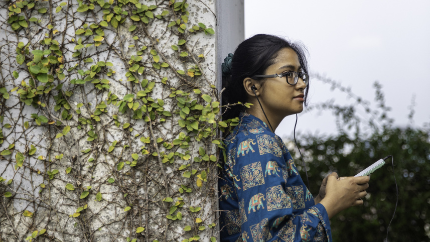 Young person listening to music