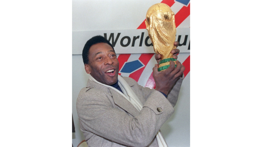 Pele with World Cup trophy.jpg