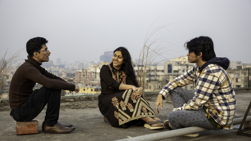 Three people talking 