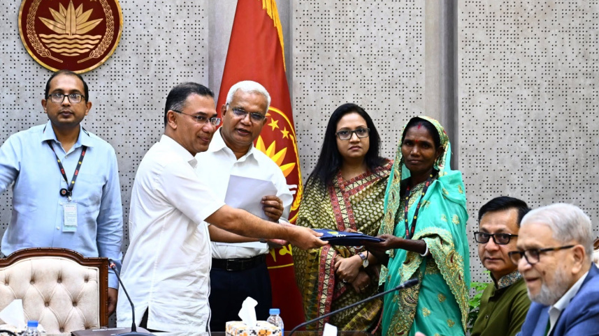 raincoat distribution for tea workers in Bangladesh