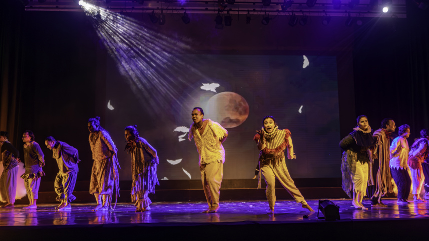 A group of performers performing on stage