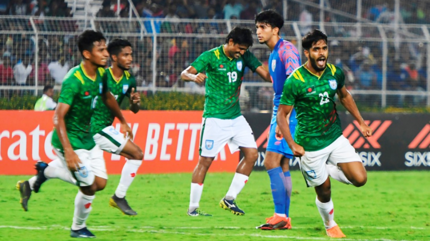 Bangladesh team celebrating a goal against India.