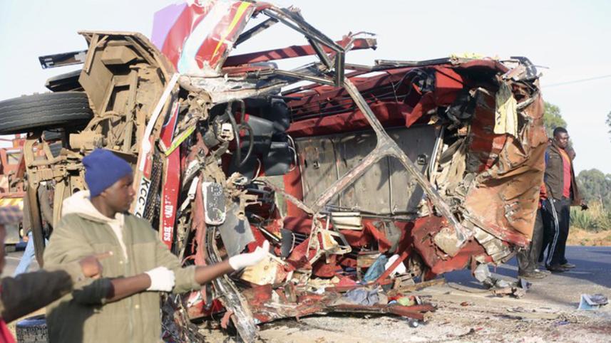 The wreckage of a bus and a truck