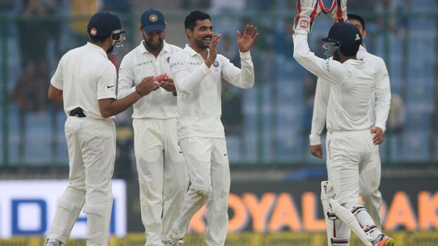 Ravindra Jadeja celebrates with his team mates