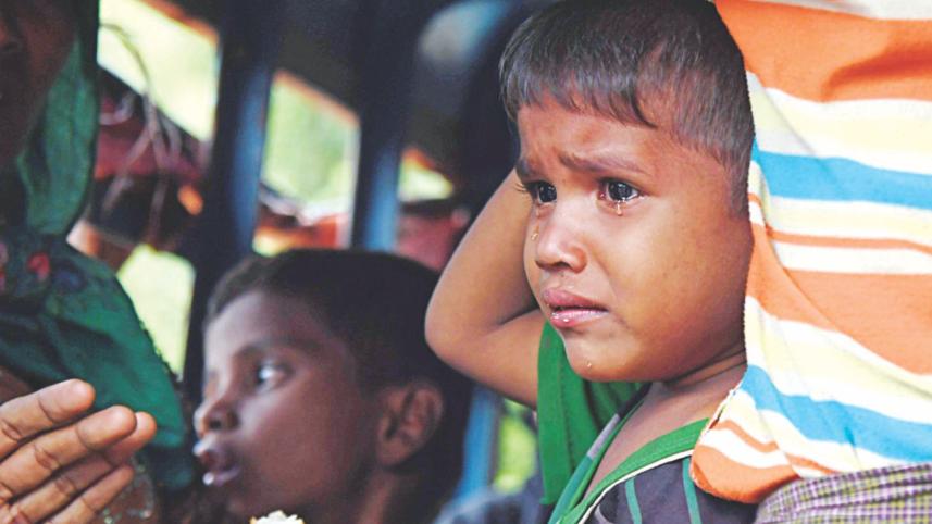 Rohingya child in tears