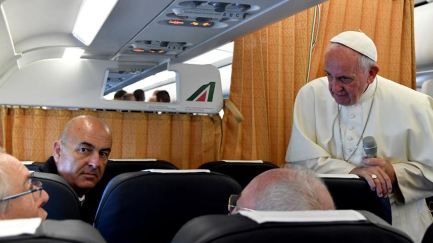 Pope Francis talks to journalists on his flight back to Rome following a visit at Armenia on June 26, 2016.