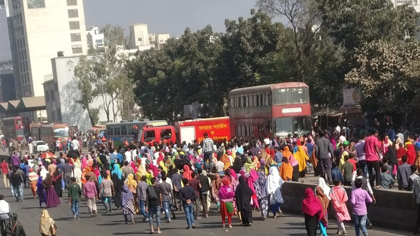 Ready-made garment workers block Dhaka-Mymensingh highway