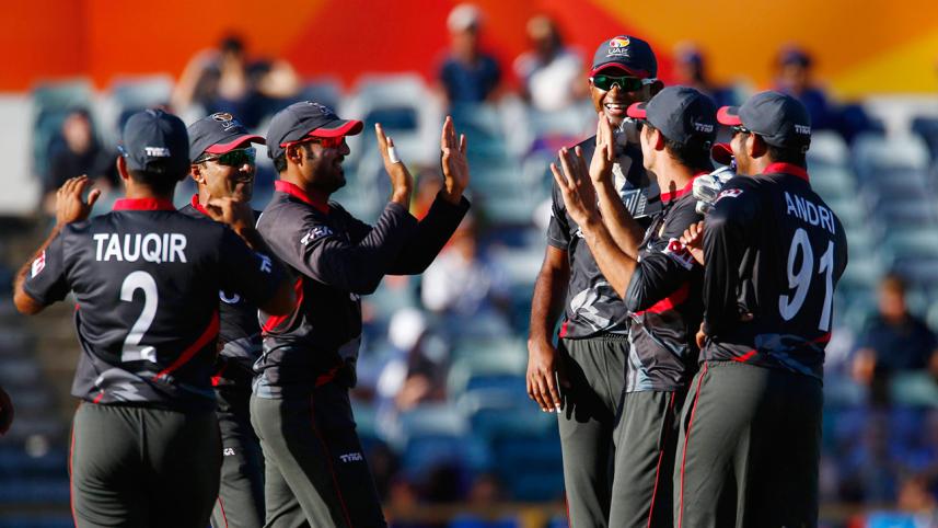 United Arab Emirates' team mates celebrate