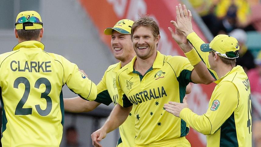 Australia's Shane Watson (2nd R) celebrates with team mates Michael Clarke (L), James Faulkner (2nd L) and Steven Smith (R) after taking the wicket of Scotland's Preston Mommsen during their Cricket World Cup match at the Bellerive Oval in Hobart, Tasmani