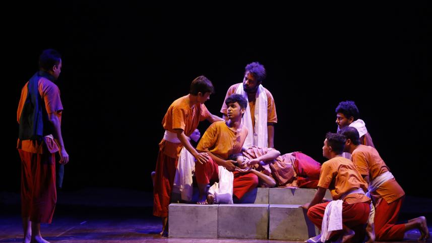 Performers acting on stage.