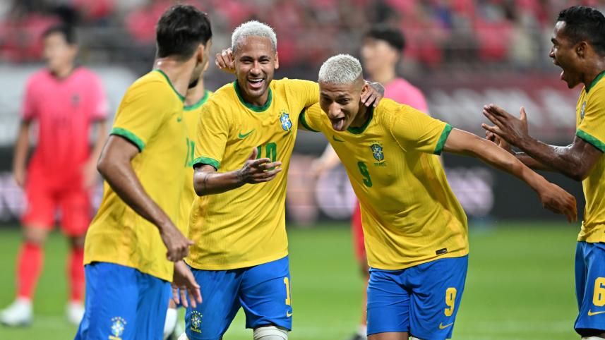 Brazil's forward Neymar (C) celebrates his goal. 