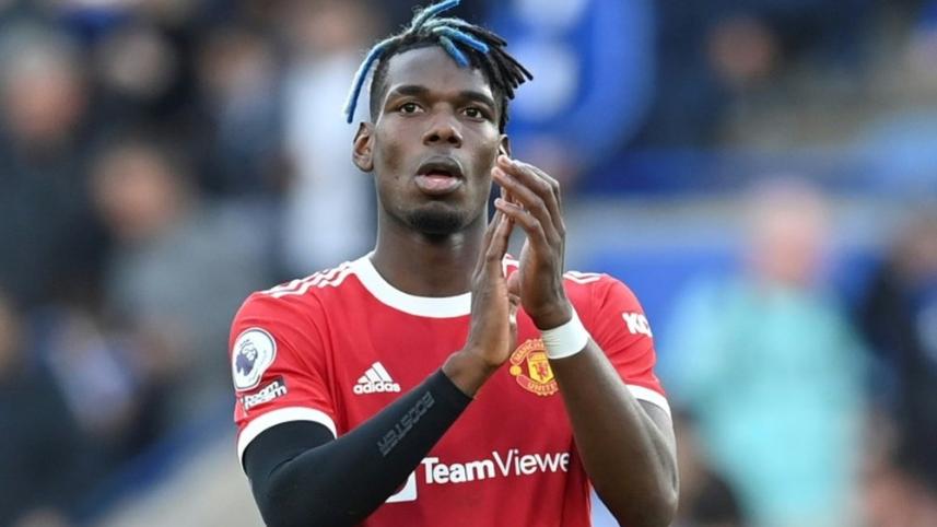 Paul Pogba playing for Manchester United