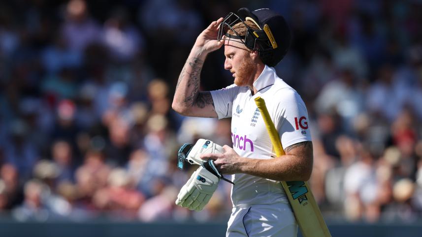 England's captain Ben Stokes reacts as he walks back to the pavilion after losing his wicket for 20 during play on day 3 of the first Test match between England and South Africa at the Lord's cricket ground in London