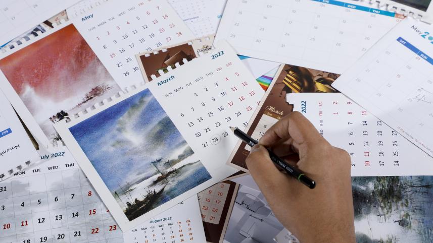 Student scribbling on calendars in a futile attempt to sort out their academic plans. 