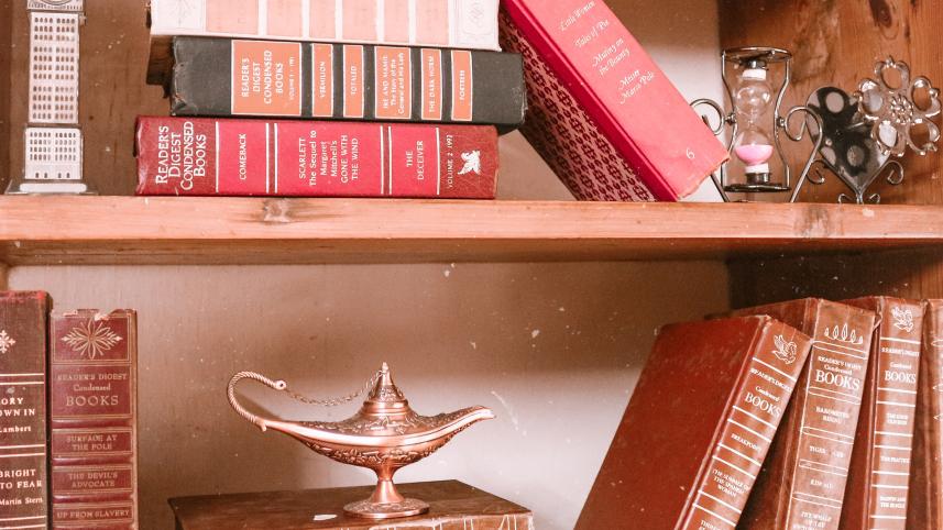 Assortment of random things on a shelf. 