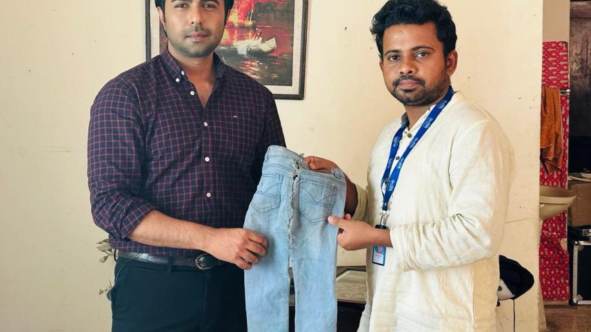 Apurba buys burnt jeans for BDT 1 lakh to support Bangabazar fire victims