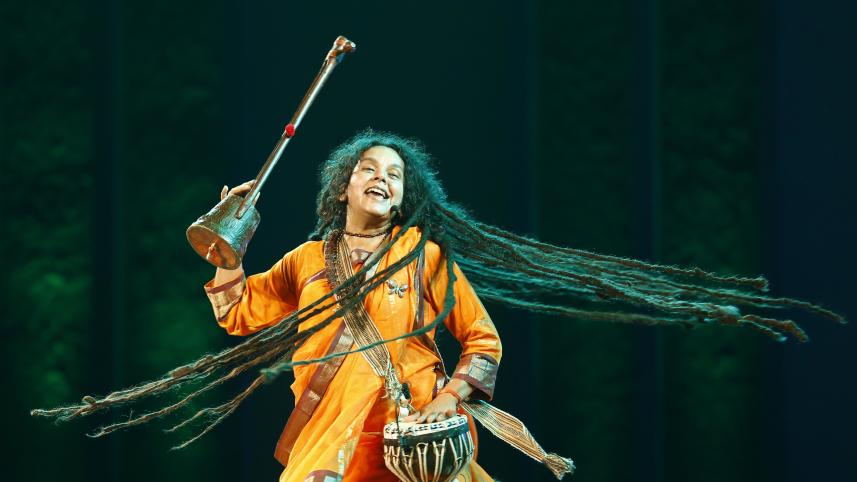 Parvathy Baul performing on stage.