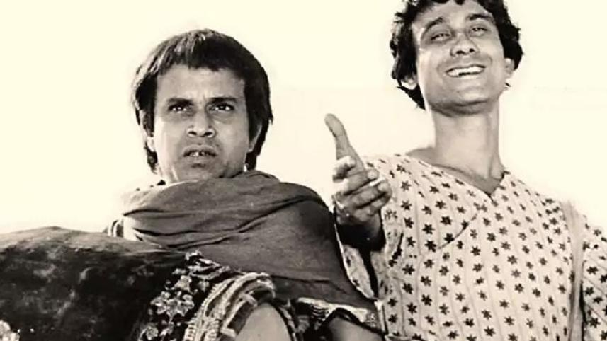 tapan_chatterjee_and_rabi_ghosh_in_a_scene_from_hirak_rajar_deshe.jpg