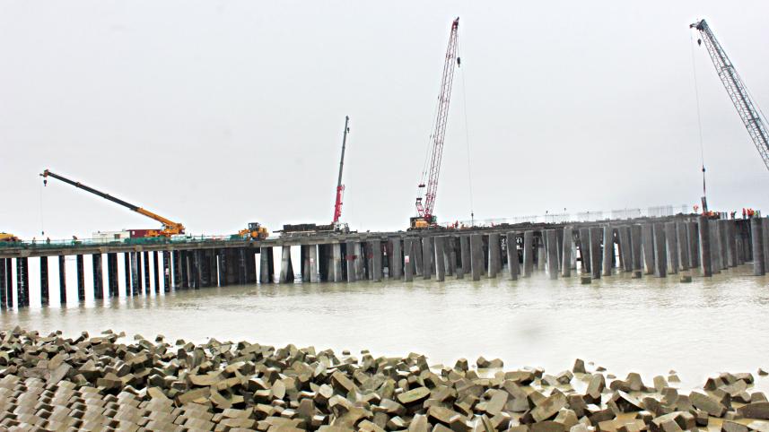 Work on the first terminal of the Payra Sea Port on the southern coast of Patuakhali is in full swing, with authorities hoping to begin operations by October.
