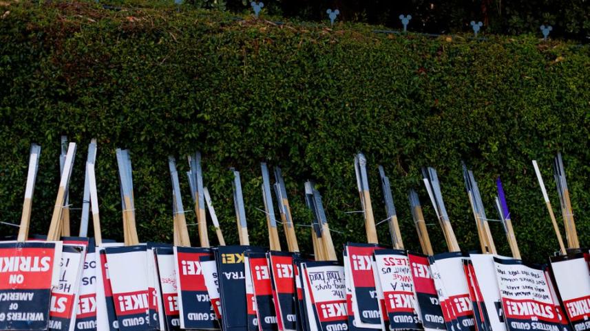 Striking Hollywood writers reach tentative deal with studios