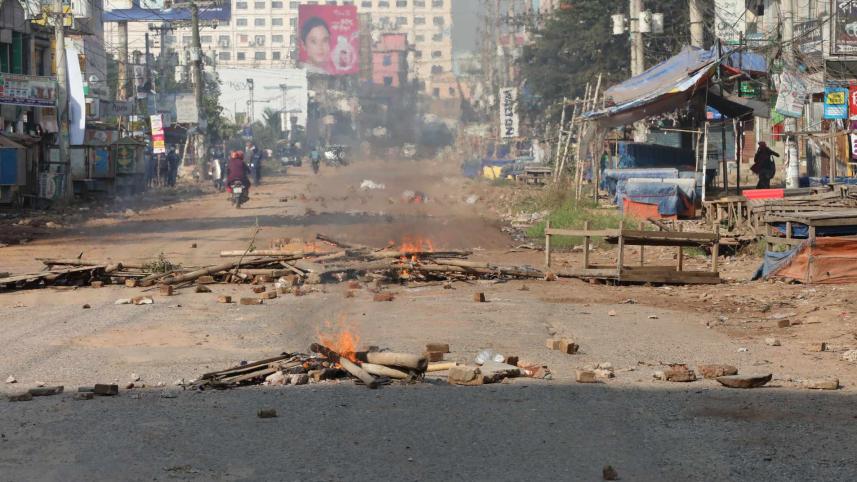 Police fired tear gas shells and used water cannons in Ashulia this morning to disperse garment workers after they blocked roads demanding an increase in wages.
