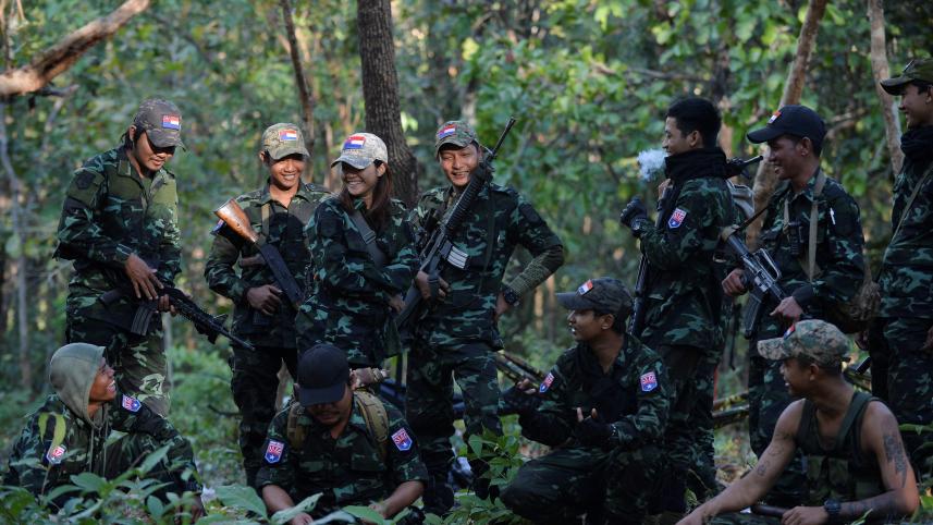 Members of the People's Defence Forces (PDF) who became guerrilla fighters after being protesters are seen on the front line in Kawkareik, Myanmar. FILE PHOTO: REUTERS