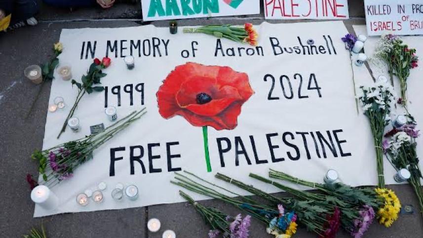 People leave notes and flowers during a vigil for US Air Force active-duty airman Aaron Bushnell outside the Israeli Embassy on February 26, 2024 in Washington, DC.
