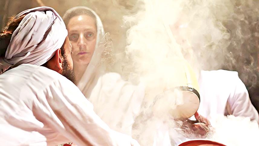 The smoke of incense for the singing sadhus on stage at a sadhusongo - Munshiganj, January 2017