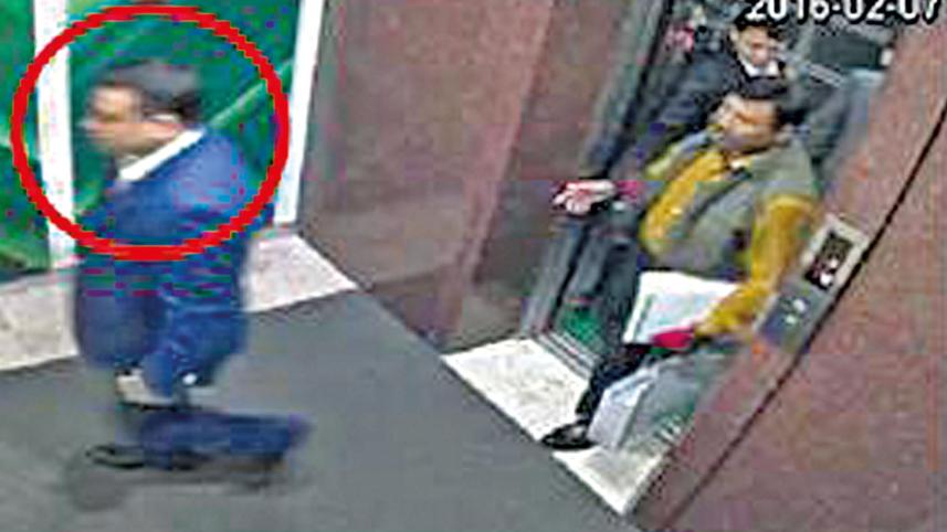 Tamal Parvez entering the NRBC Bank boardroom to attend a board meeting accompanied by a gunman in 2016