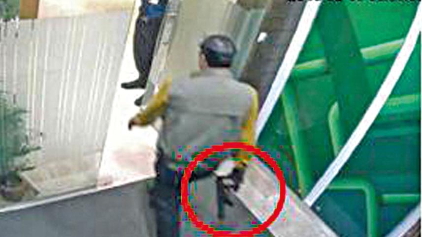 Tamal Parvez's personal bodyguard escorts him to the boardroom.