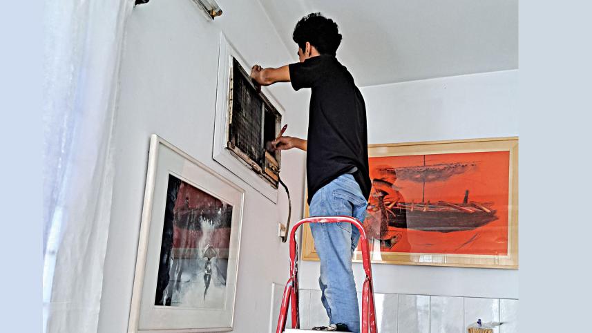 Air conditioning repair workers busy in summer heat