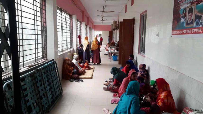 People waiting in a hospital corridor