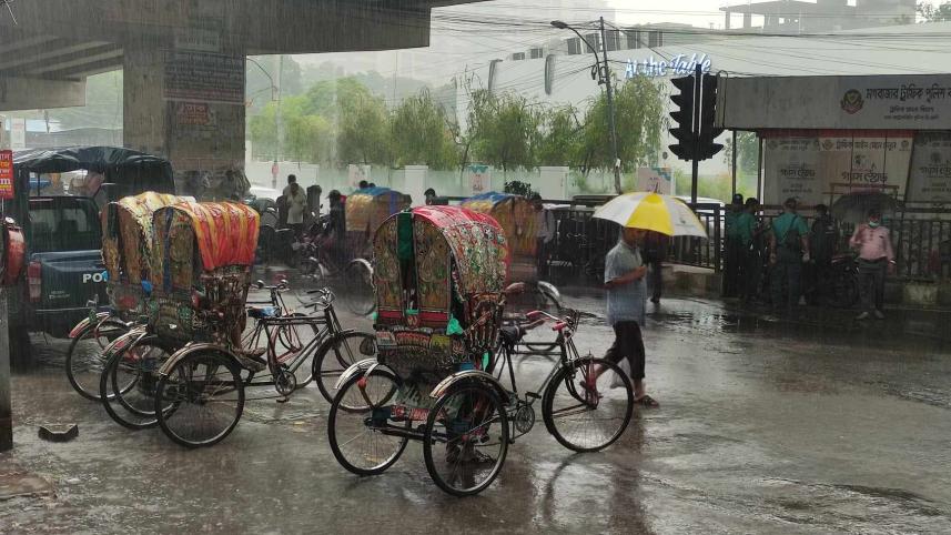 commuters suffer Dhaka rain waterlogging