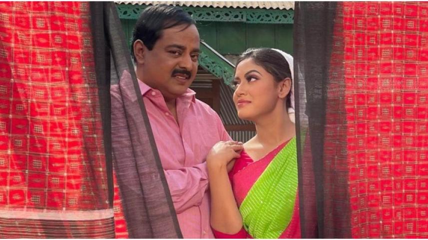 Omanush Holo Manush