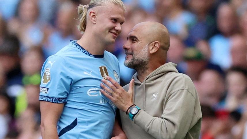 Pep Guardiola and Erling Haaland 