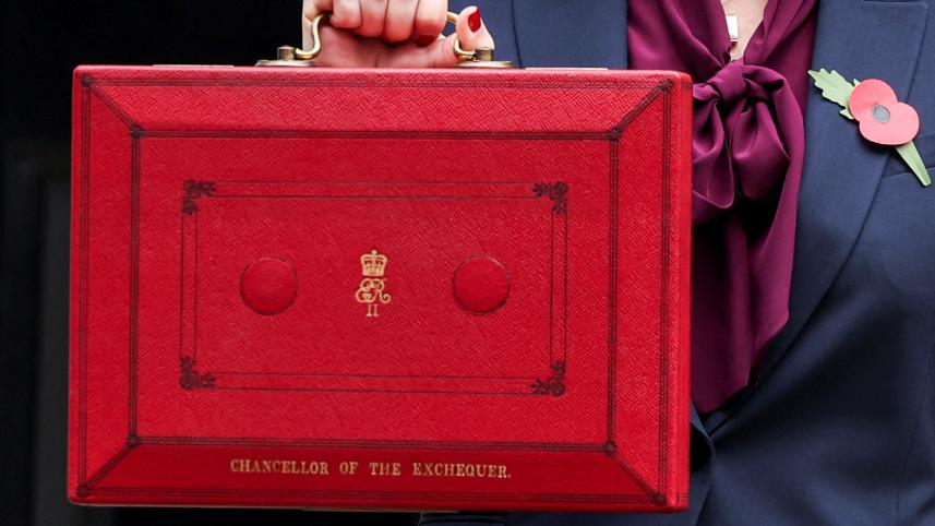 Britain's Chancellor of the Exchequer Rachel Reeves poses with the red budget box outside her office on Downing Street in London, Britain October 30, 2024. Photo: REUTERS