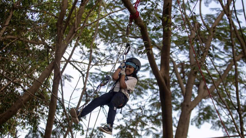 A child on a zipline 