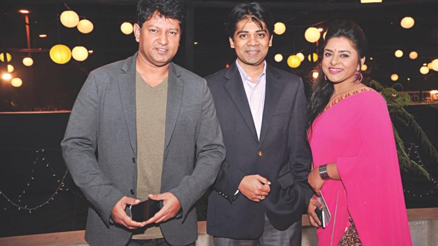 Mahfuz Ahmed, Jitu Ahsan and Jyotika Jyoti strike a pose for the