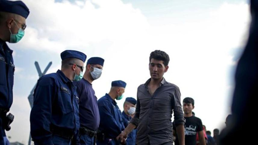 migrants-_Reuters.jpg