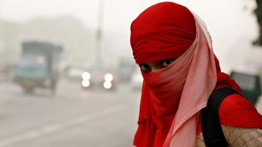 A woman wearing a scarf